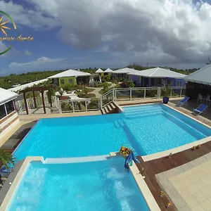 https://la-palmeraie-doree.comcaribbean.com